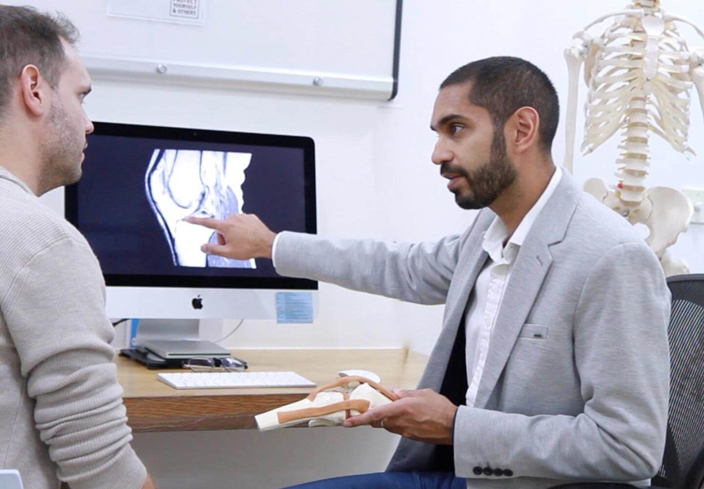 Dr Ajai Seth in consultation